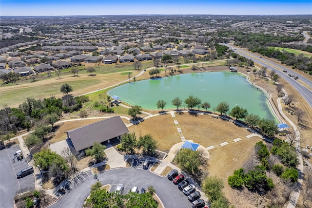 aerial view with a residential view and a water view