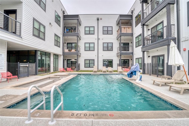 pool with a patio