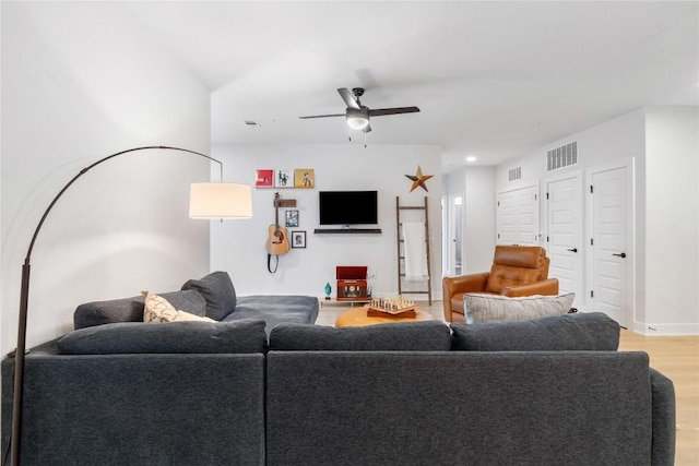 living area featuring light wood-type flooring, visible vents, recessed lighting, and a ceiling fan