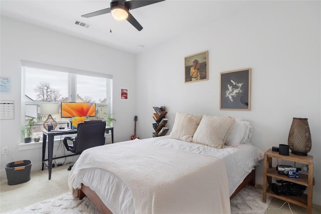3101 Govalle Ave Unit 206, Austin, TX 78702 - carpeted bedroom featuring a desk and a ceiling fan