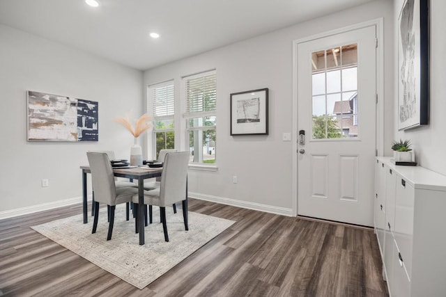 7902 Sutcliffe Dr, Austin, TX 78744 - dining space with dark wood-style flooring, recessed lighting, and baseboards