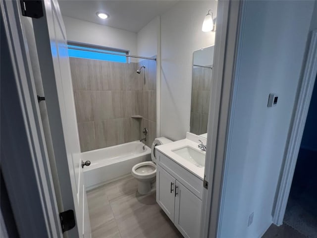 bathroom with toilet, vanity, and shower / tub combination