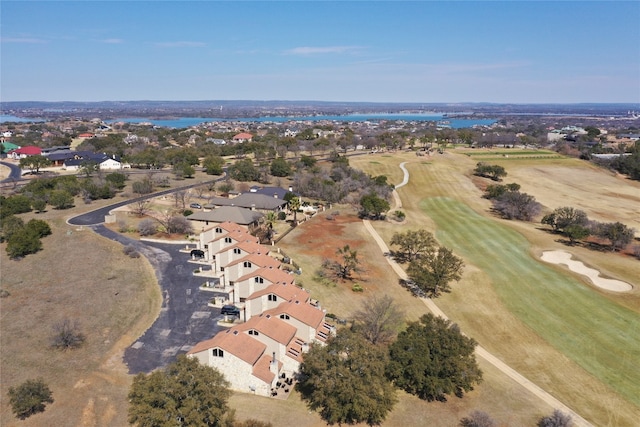 bird's eye view with golf course view and a water view