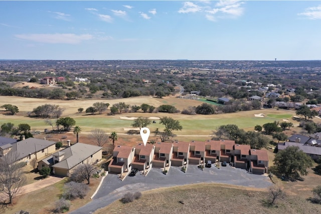 birds eye view of property with a residential view and view of golf course