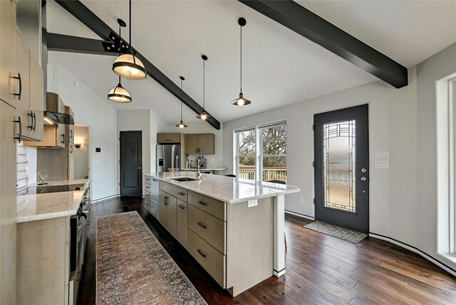 kitchen with a sink, stainless steel fridge, vaulted ceiling with beams, and dark wood-style flooring