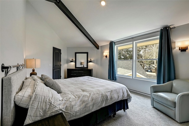 carpeted bedroom with lofted ceiling with beams