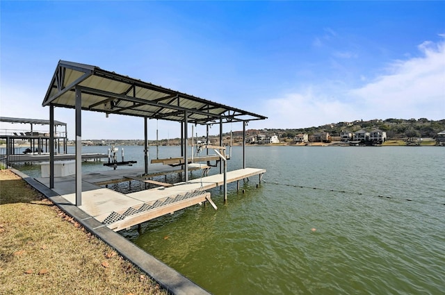 dock area featuring a water view and boat lift