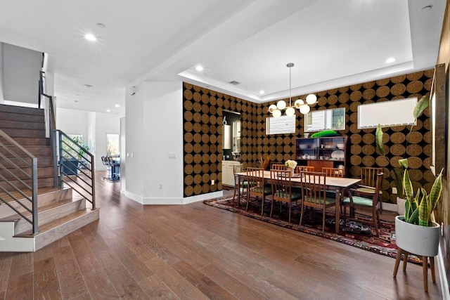 wine room featuring recessed lighting, baseboards, wood finished floors, and wallpapered walls