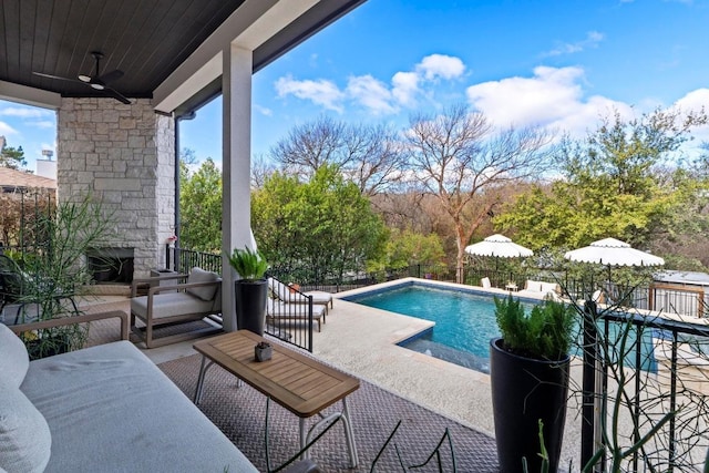 view of pool with an outdoor living space, fence, a fenced in pool, ceiling fan, and a patio area