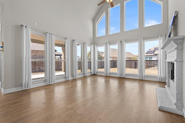 interior space with ceiling fan