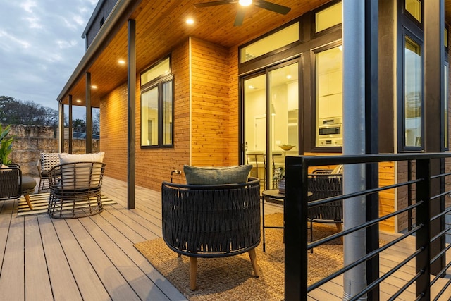 wooden deck with ceiling fan