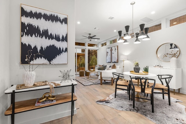 dining area with visible vents, recessed lighting, ceiling fan, and wood finished floors