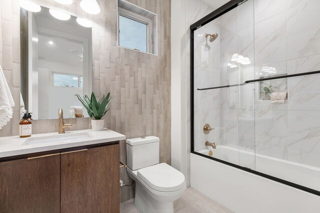 900 S 2nd St Unit 22, Austin, TX 78704 - full bathroom featuring vanity and combined bath / shower with glass door