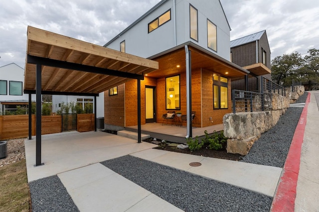 900 S 2nd St Unit 22, Austin, TX 78704 - rear view of house with covered porch