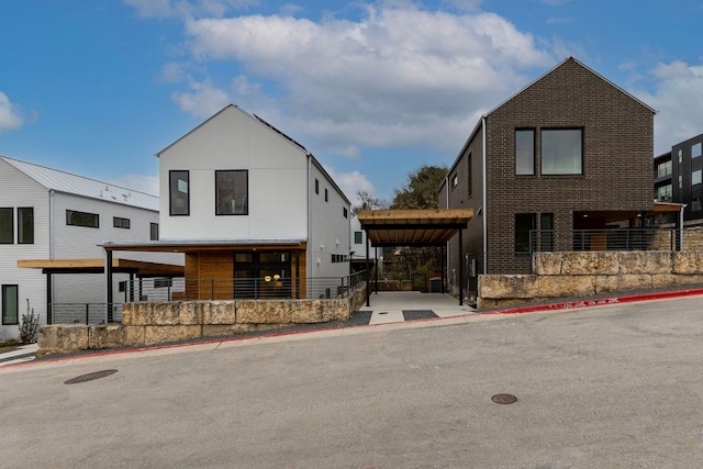 view of front of home with an attached carport