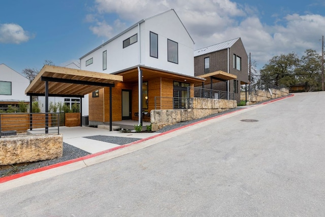 900 S 2nd St Unit 22, Austin, TX 78704 - view of front of house with concrete driveway