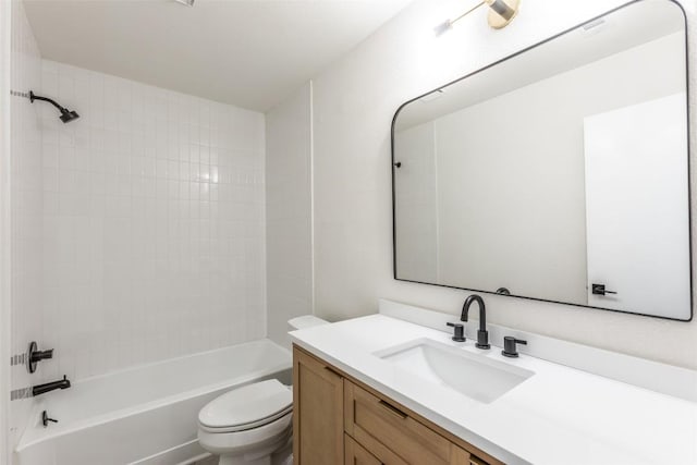 full bathroom featuring toilet, vanity, and bathing tub / shower combination