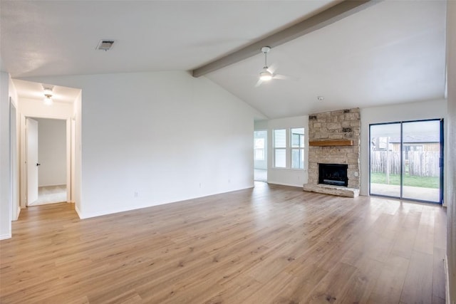 unfurnished living room with visible vents, plenty of natural light, light wood-style floors, and ceiling fan