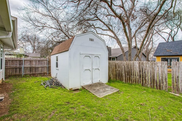 view of shed featuring a fenced backyard