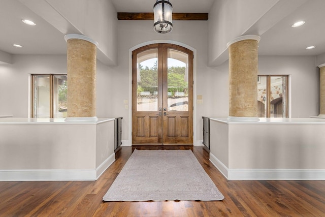 9104 Atwater Cv, Austin, TX 78733 - foyer entrance with ornate columns, french doors, wood finished floors, recessed lighting, and baseboards