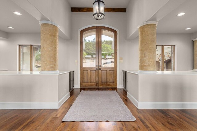 9104 Atwater Cv, Austin, TX 78733 - foyer featuring decorative columns, french doors, wood finished floors, recessed lighting, and beamed ceiling