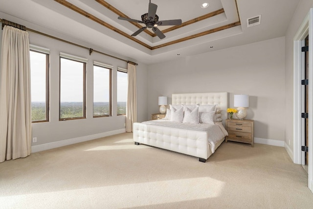 9104 Atwater Cv, Austin, TX 78733 - bedroom featuring light colored carpet, a tray ceiling, recessed lighting, and ceiling fan