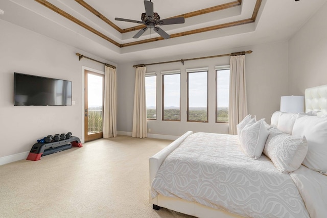 9104 Atwater Cv, Austin, TX 78733 - bedroom with a raised ceiling, access to outside, and light colored carpet