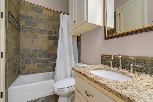 9104 Atwater Cv, Austin, TX 78733 - full bath with decorative backsplash, vanity, toilet, and shower / tub combo