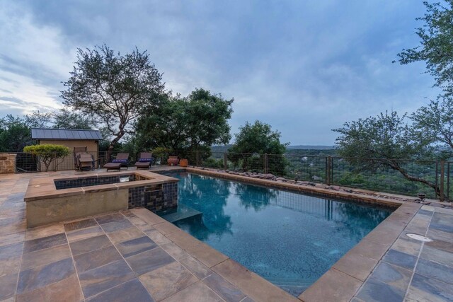 9104 Atwater Cv, Austin, TX 78733 - view of swimming pool with a fenced backyard, a patio area, and a pool with connected hot tub