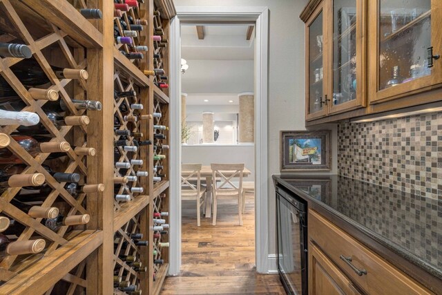 9104 Atwater Cv, Austin, TX 78733 - wine cellar with wine cooler and dark wood-type flooring