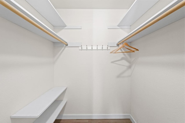 11216 Henge Dr, Austin, TX 78759 - spacious closet with wood finished floors