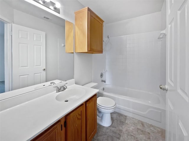 bathroom featuring visible vents, toilet, vanity, and bathing tub / shower combination