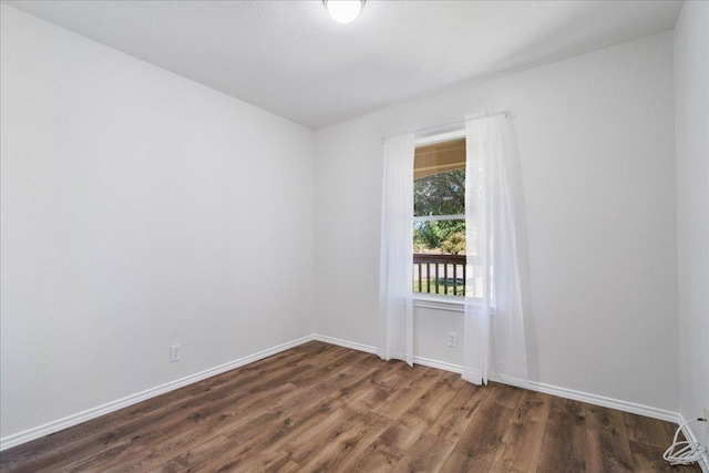 304 Watergate Way, Hutto, TX 78634 - unfurnished room with dark wood-type flooring and baseboards