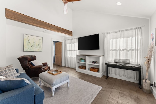 living area with wood-type flooring and vaulted ceiling