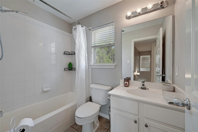 full bath featuring tile patterned floors, toilet, shower / tub combo, baseboards, and vanity