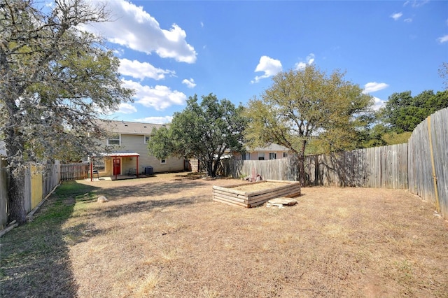 view of yard with a fenced backyard