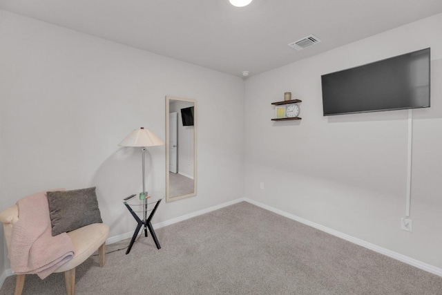 unfurnished room featuring carpet flooring, baseboards, and visible vents