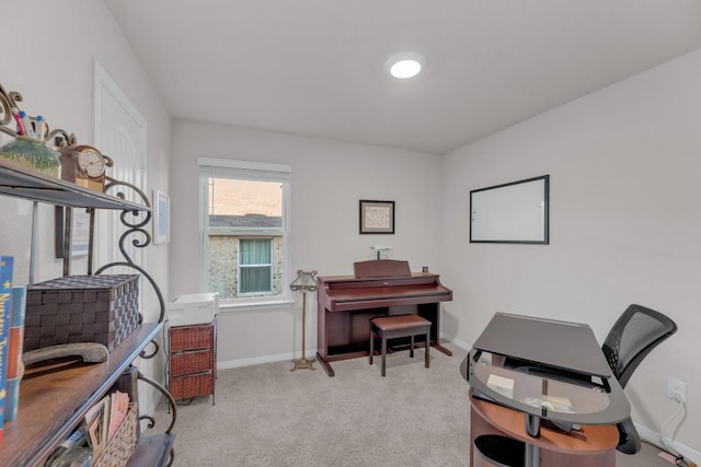 office space featuring baseboards and carpet floors