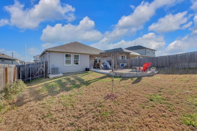 rear view of house with central air condition unit, a patio, a fenced backyard, and a pergola