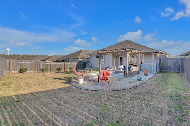 rear view of property with a patio, a lawn, a fenced backyard, and a pergola