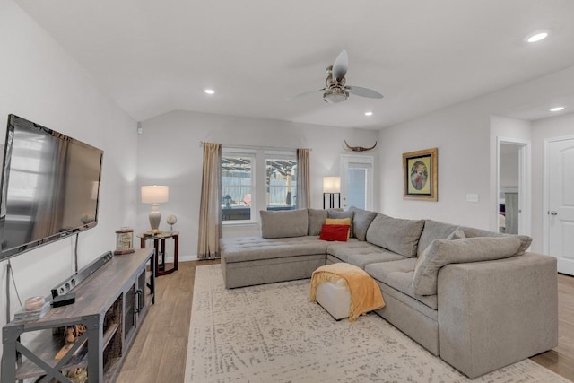 living room with recessed lighting, light wood-type flooring, and ceiling fan