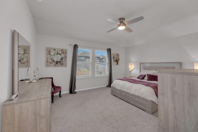 bedroom featuring baseboards, carpet, and ceiling fan