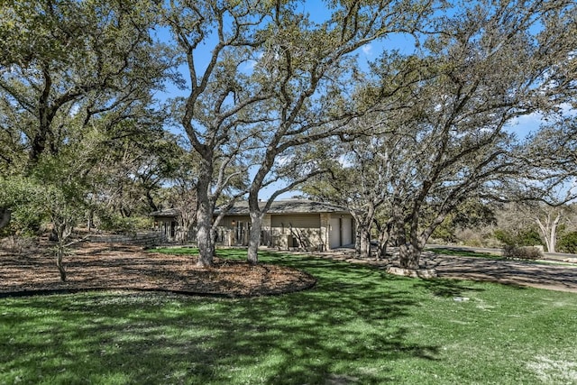 view of yard featuring a garage