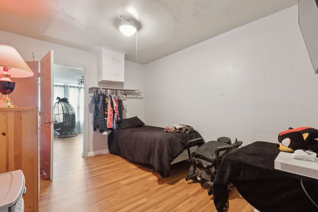 bedroom with light wood-style flooring