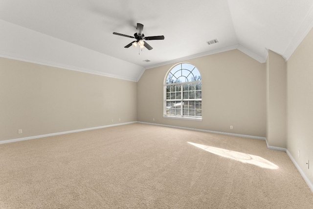 additional living space with visible vents, baseboards, carpet floors, lofted ceiling, and ceiling fan