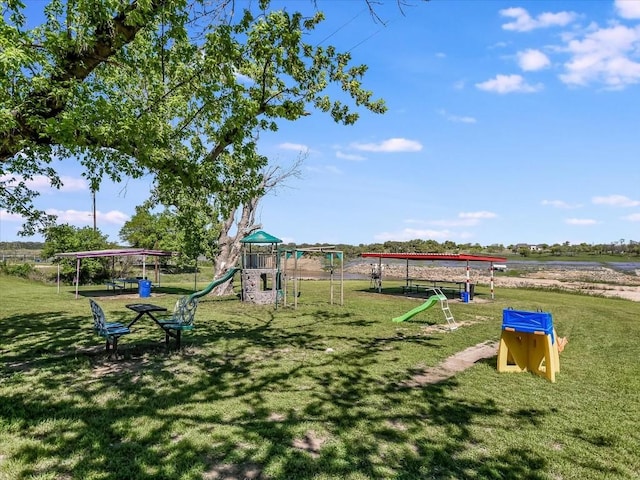 community play area with a lawn