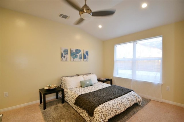 carpeted bedroom featuring visible vents, baseboards, vaulted ceiling, recessed lighting, and a ceiling fan