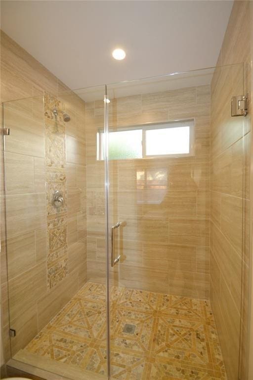 bathroom featuring a stall shower