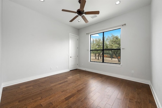 unfurnished room with ceiling fan, baseboards, dark wood finished floors, and recessed lighting