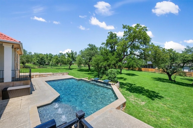 outdoor pool featuring a patio area and a lawn